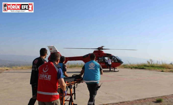 Dağlık alana düşen paraşütçü ambulans helikopterle hastaneye sevk edildi