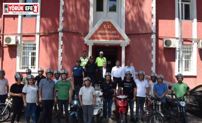 Bozdoğan’da motorculara kask dağıtımı sürüyor