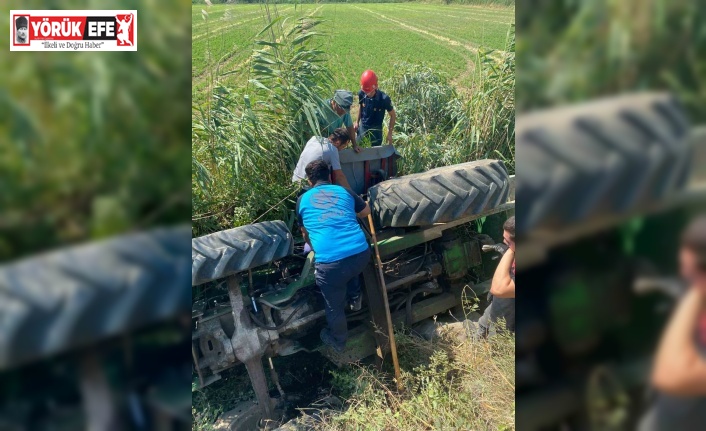 Devrilen traktörün altına kalan şahıs yaralı kurtuldu