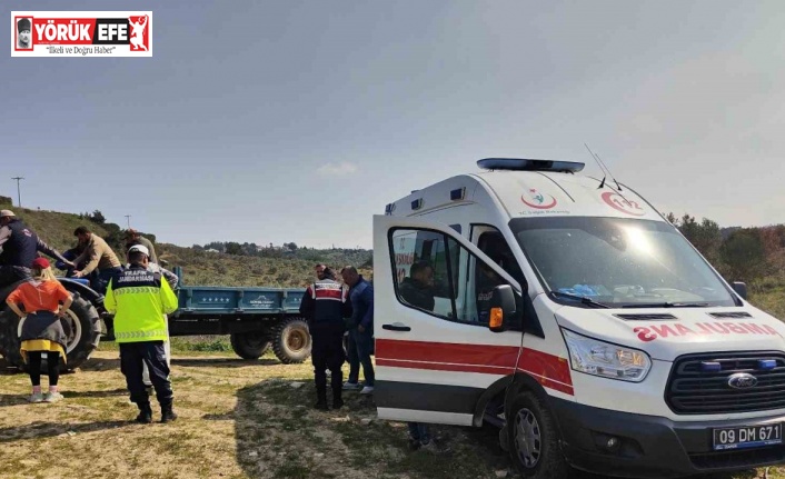 Tarlada devrilen traktörün üzerinden savrulan çiftçi yaralandı